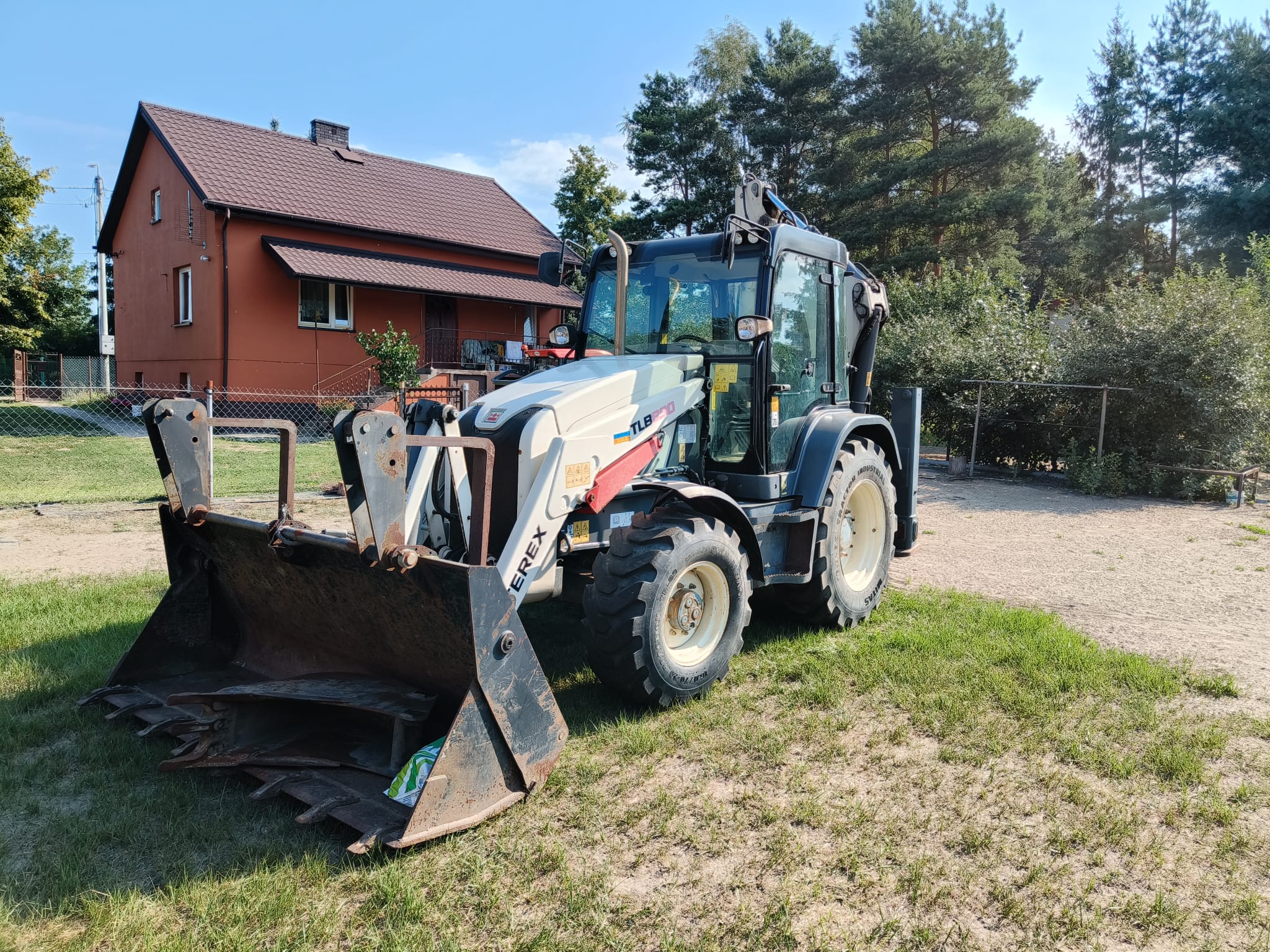 Terex TLB 890 — wycena wartości maszyny do autocasco